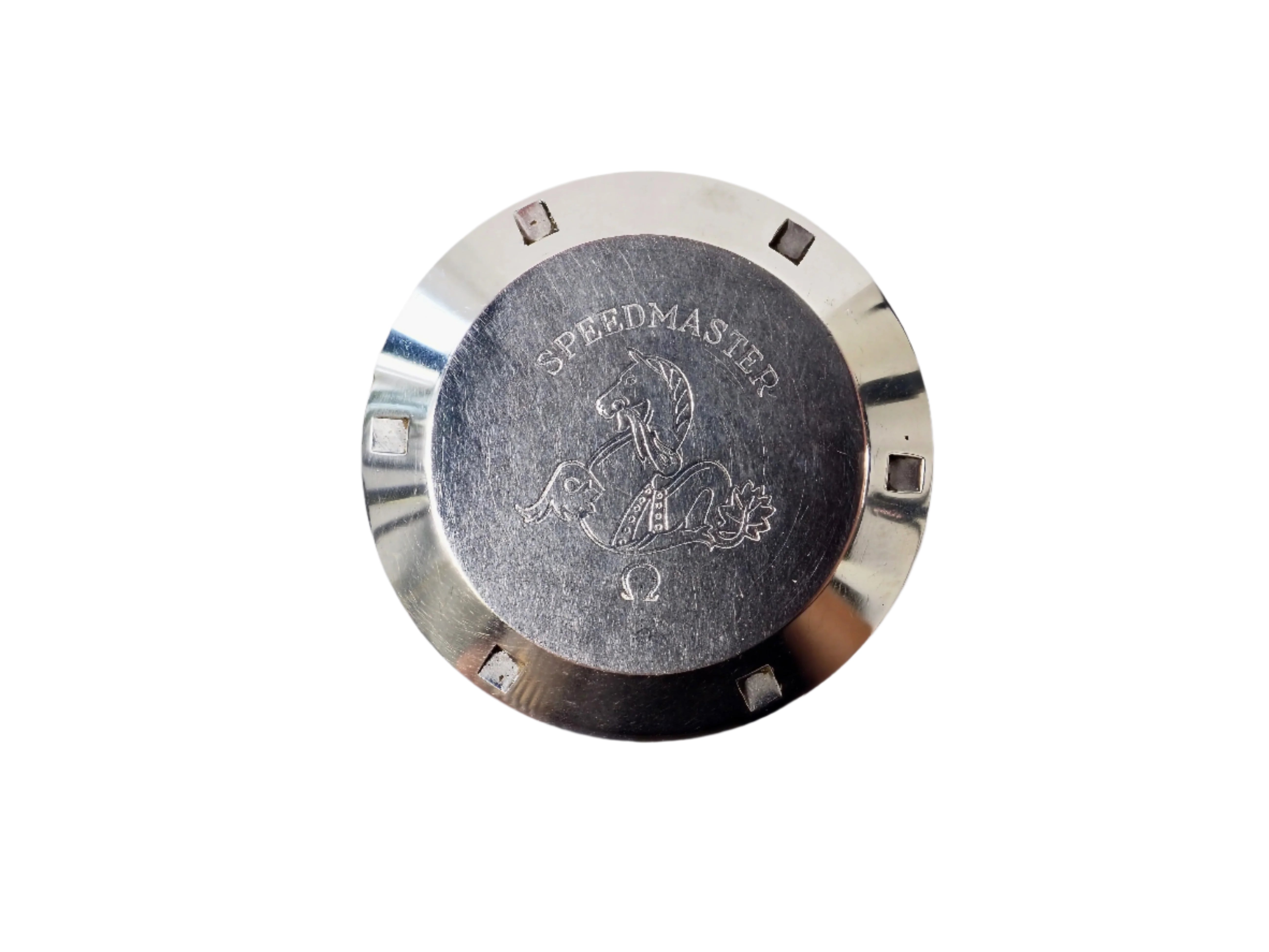 Metallic watch case with 'Speedmaster' branding on a white background