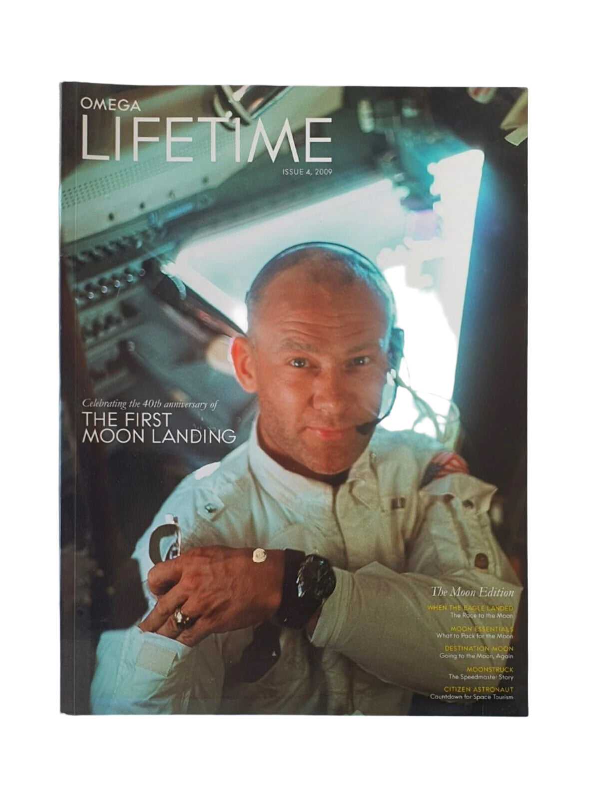 Magazine cover featuring Buzz Aldrin in a space suit with text about the first moon landing.